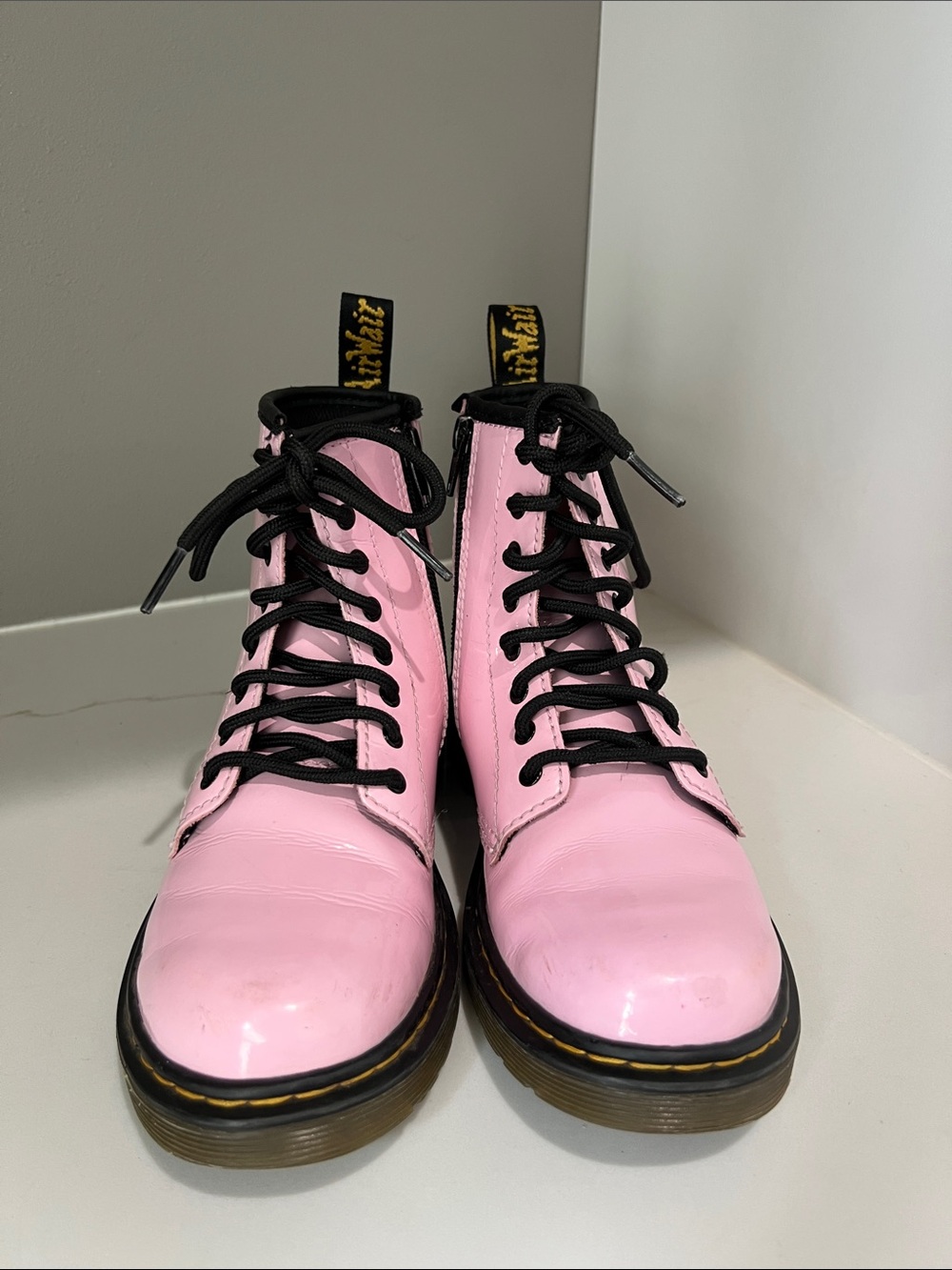 Dr. Martens Pink Patent Lace-Up Combat Boots with Black Laces